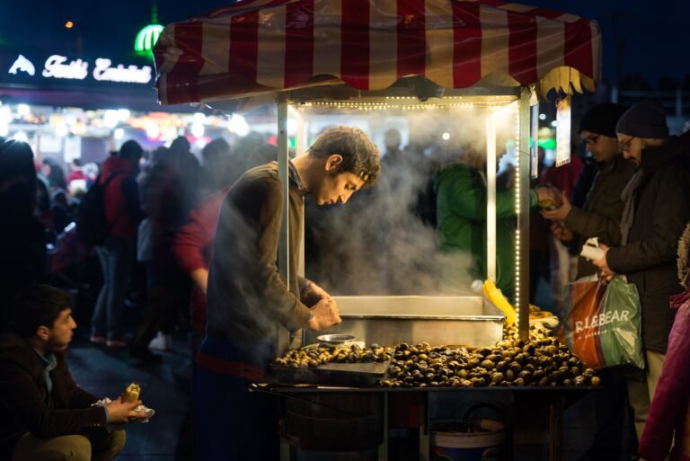 Picture of a food vendor working late into the night